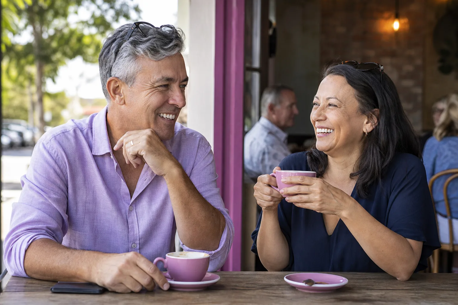 Mature couple talking over coffee in Glasgow