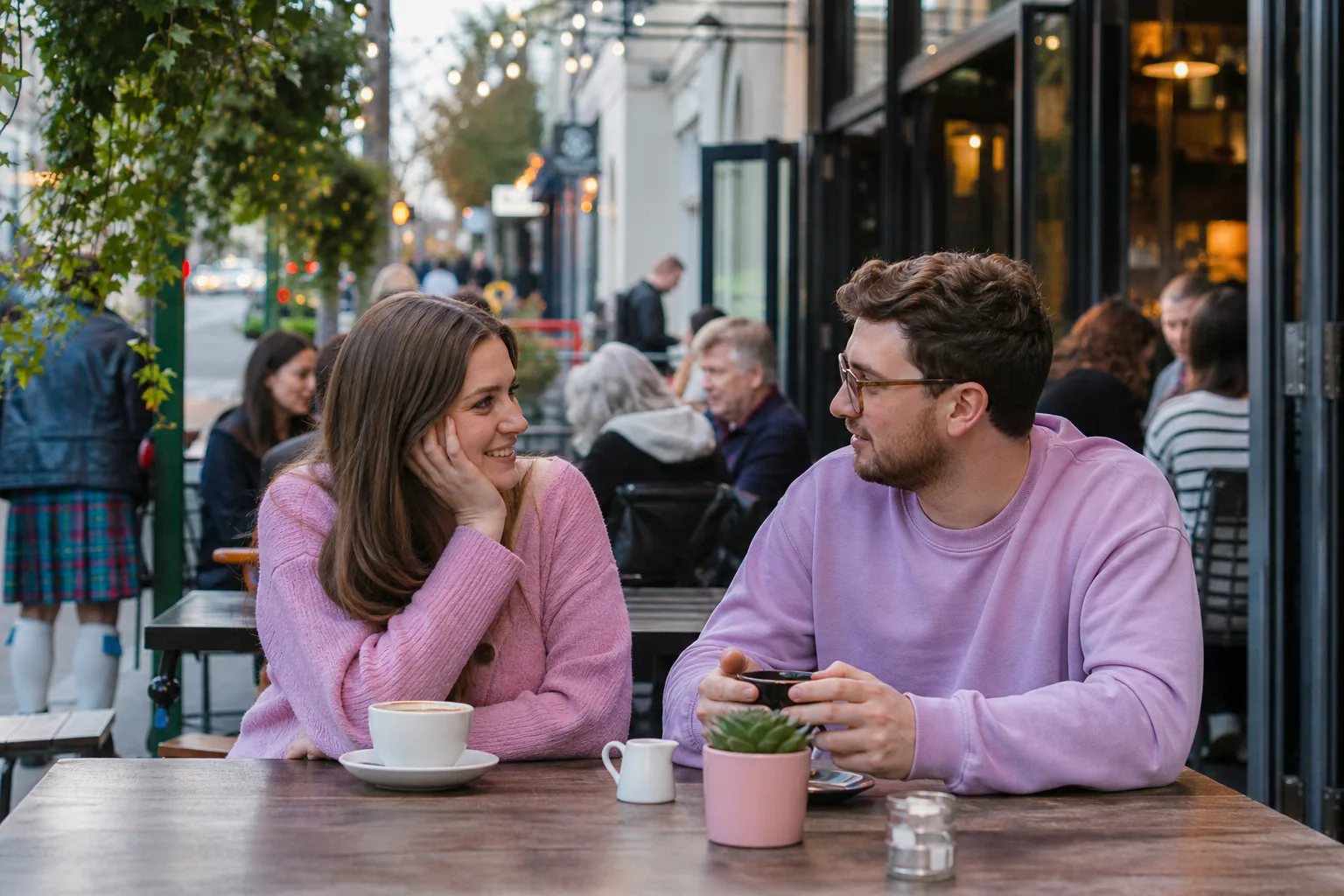 Glasgow singles chatting over coffee in a city centre café